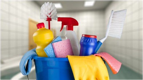 Office cleaning service working in a modern Ilford business reception area