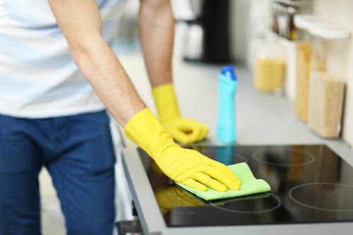 Cleaners working safely in a well-organised environment